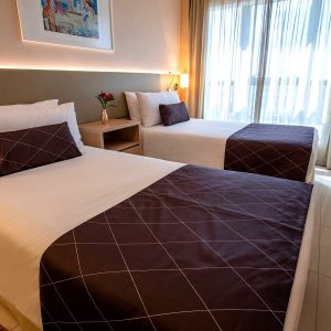 quarto superior solteiro hotel cullinan hplus em brasilia