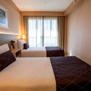 quarto superior solteiro hotel cullinan hplus em brasilia